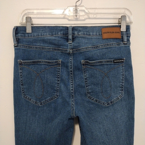 Calvin Klein - Distressed Mid Rise Skinny Jeans - Picture 8 of 15